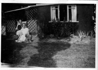 The Poplars residence showing my Mother and Grandmother at the side of house. The Poplars residence showing my Mother and Grandmother at the side of house.